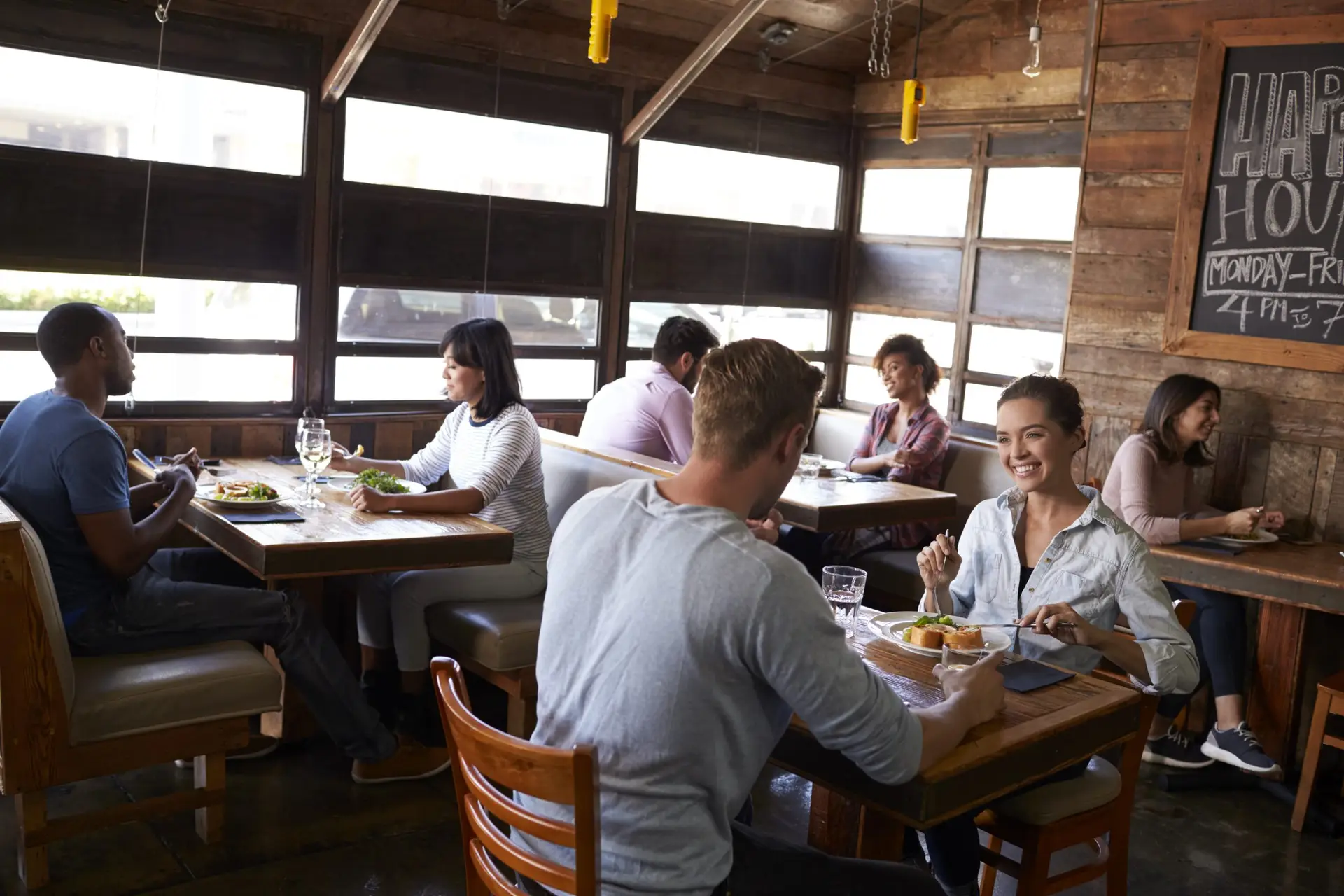 Young couples eating lunch relax in a restaurant